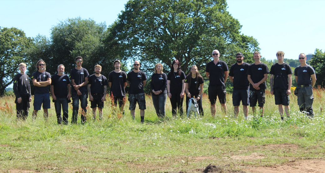 Photo of EPM staff, Outside in front of trees